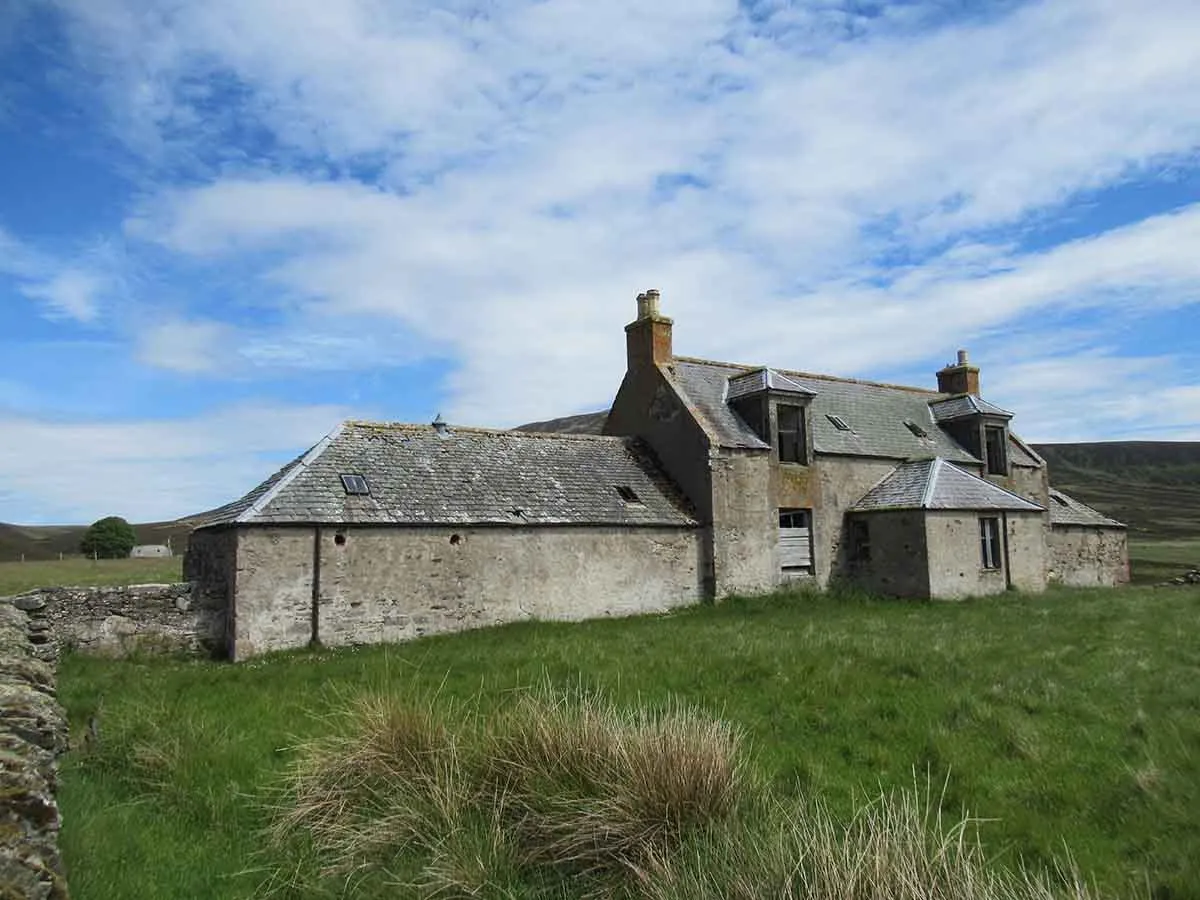 Photo of an abandoned house for sale in Scotland.