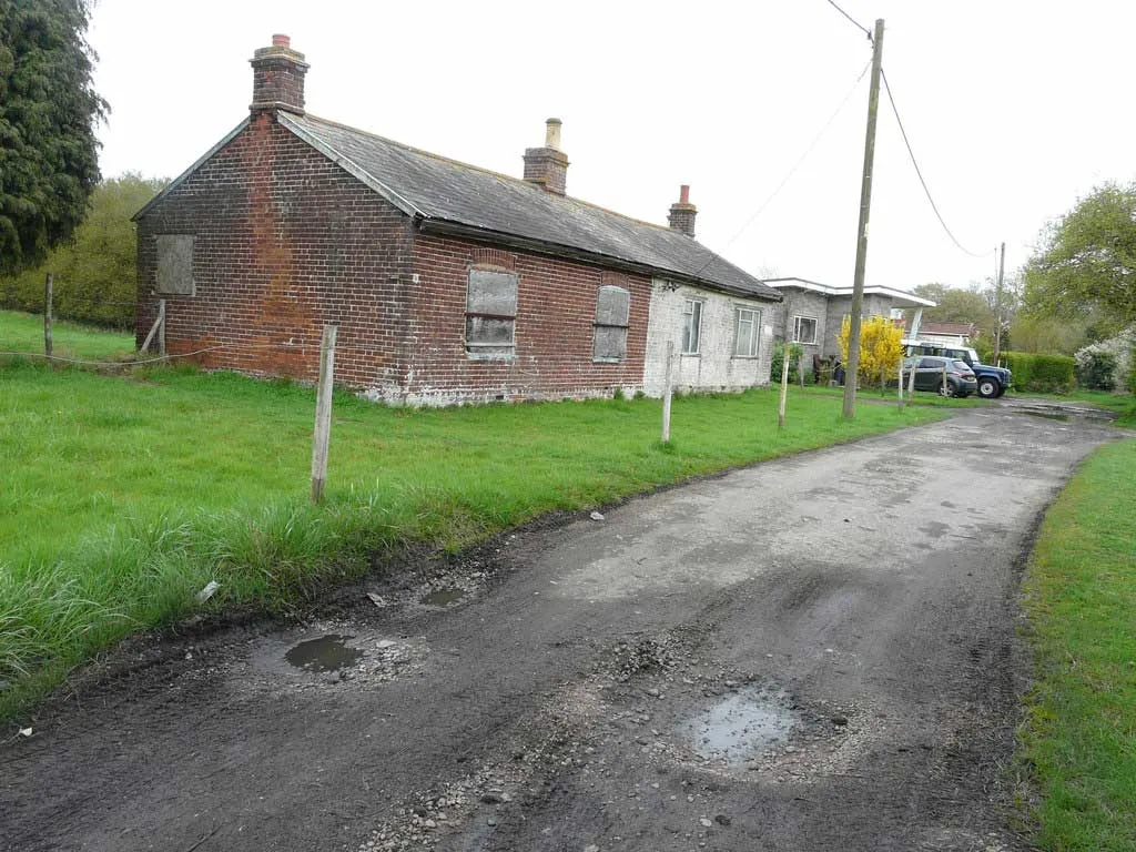 Photo of an abandoned house suitable for renovation and restoration.