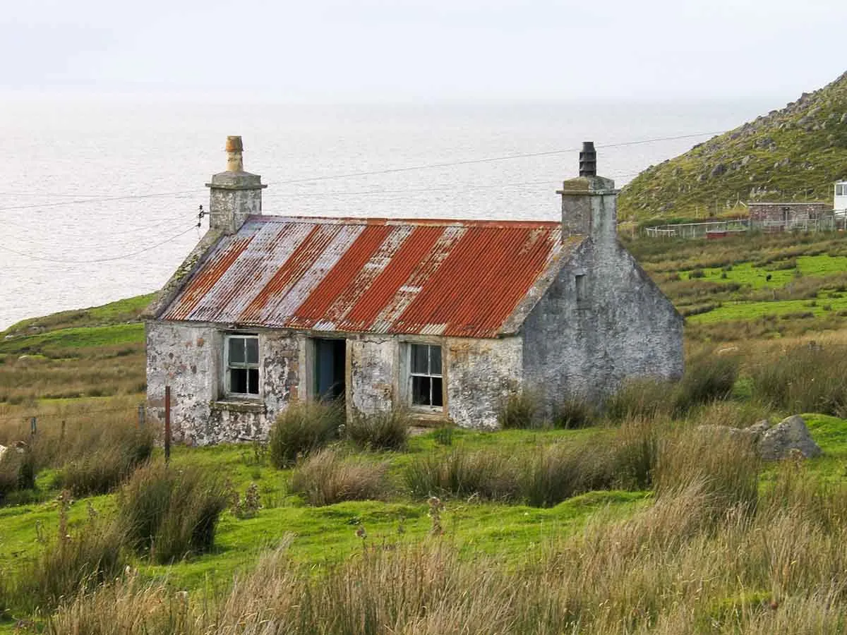 Photo of an abandoned rural cottage in Scotland