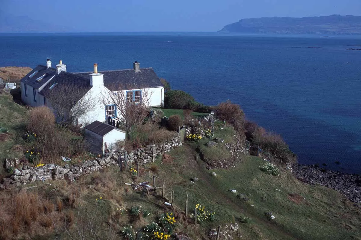 Photo showing a coastal cottage for sale in Scotland.