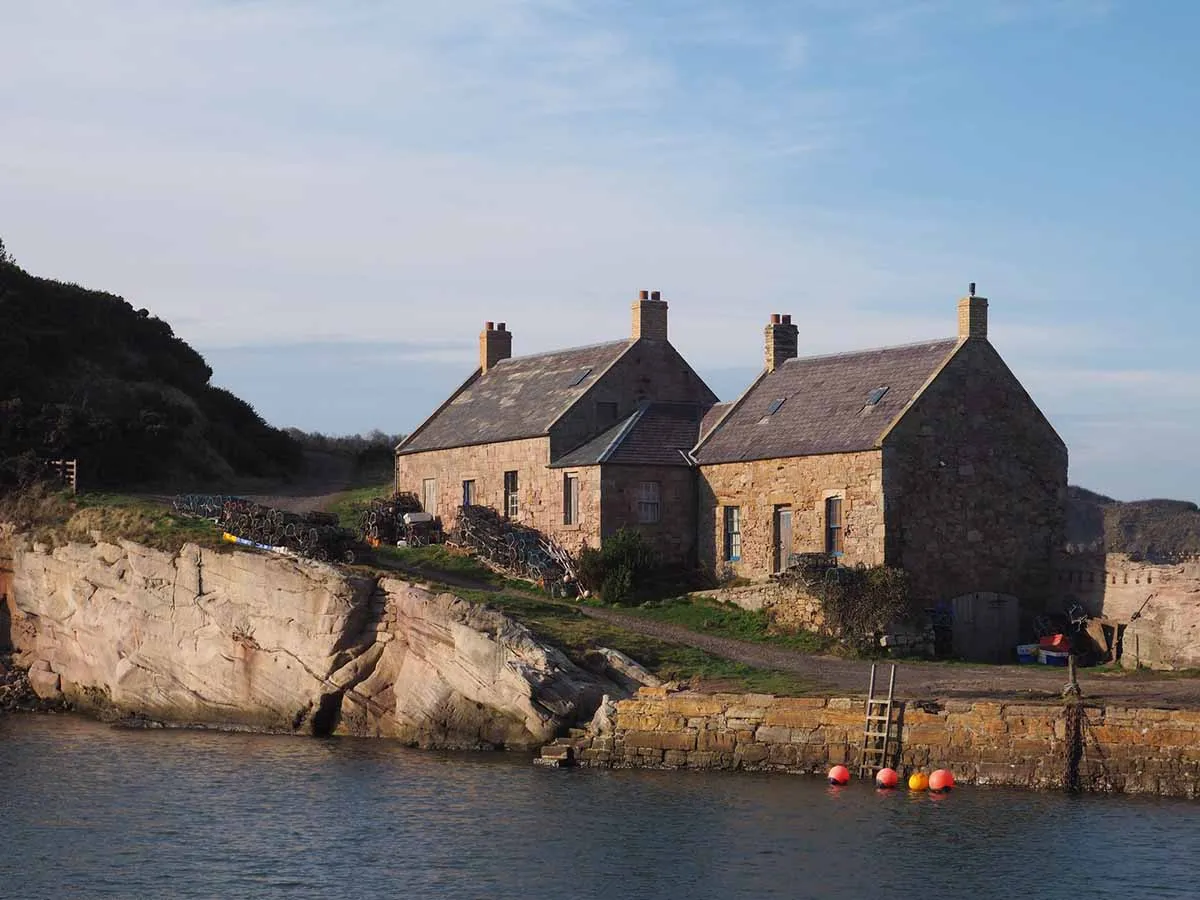 photo of a cottage near the sea with damp problems