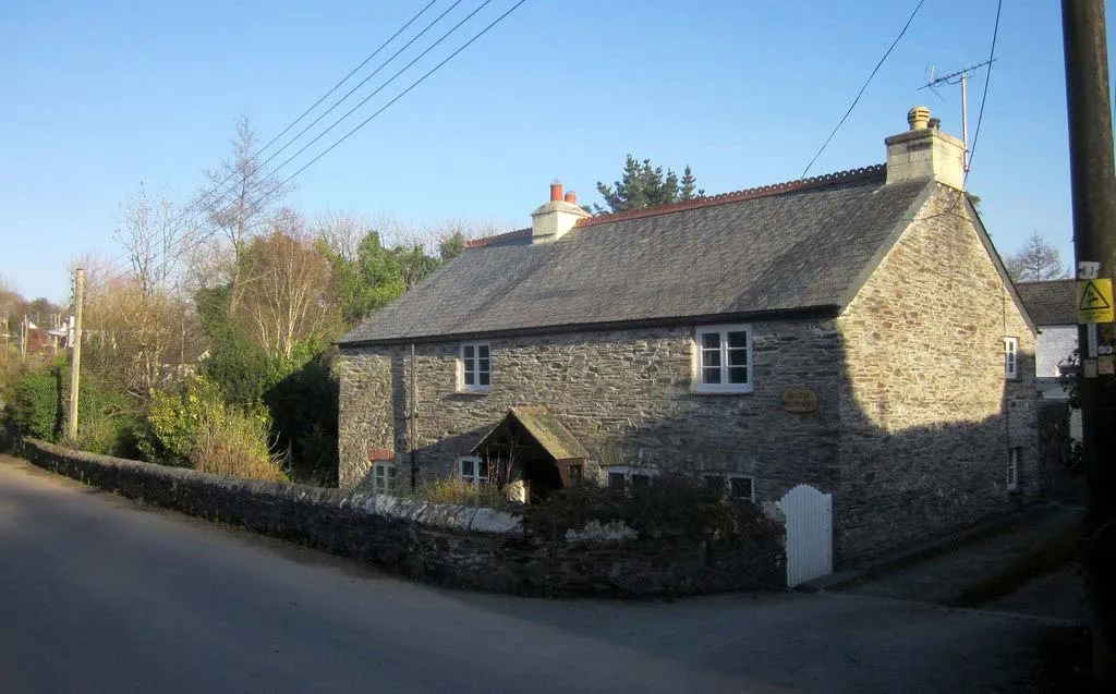 A photo of a stone cottage which has undergone a damp survey