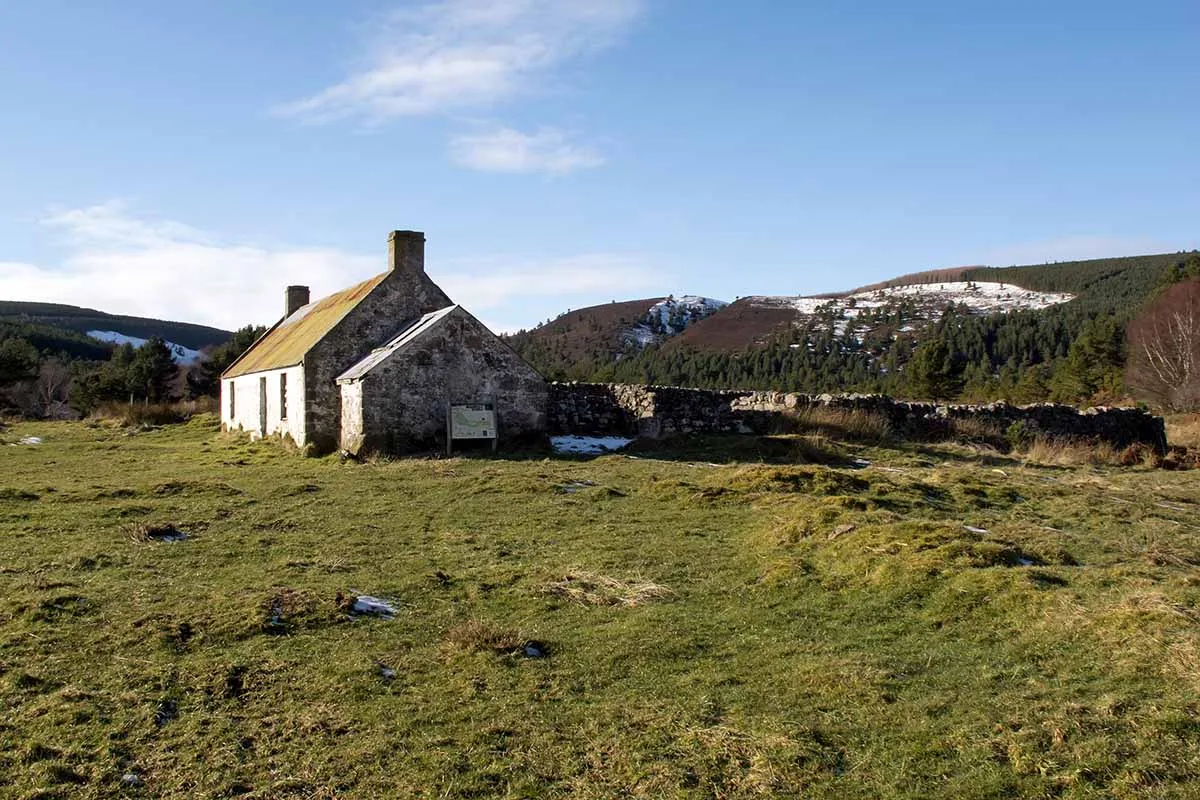 Photo of a typical croft in Scotland, showing the croft house and surrounding land.