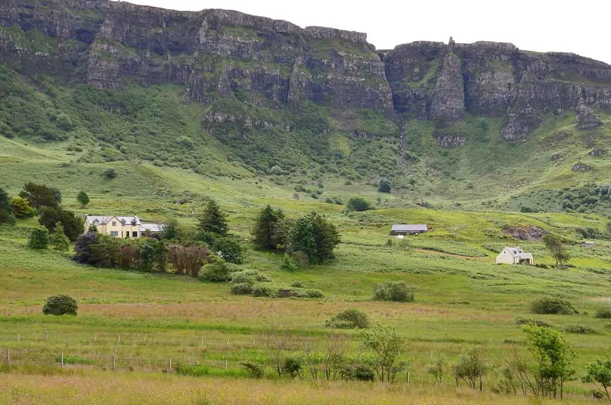 Image of some houses with land.