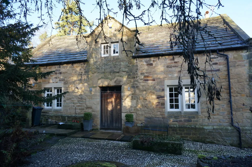 Photo of a small cottage which obtained listed building consent