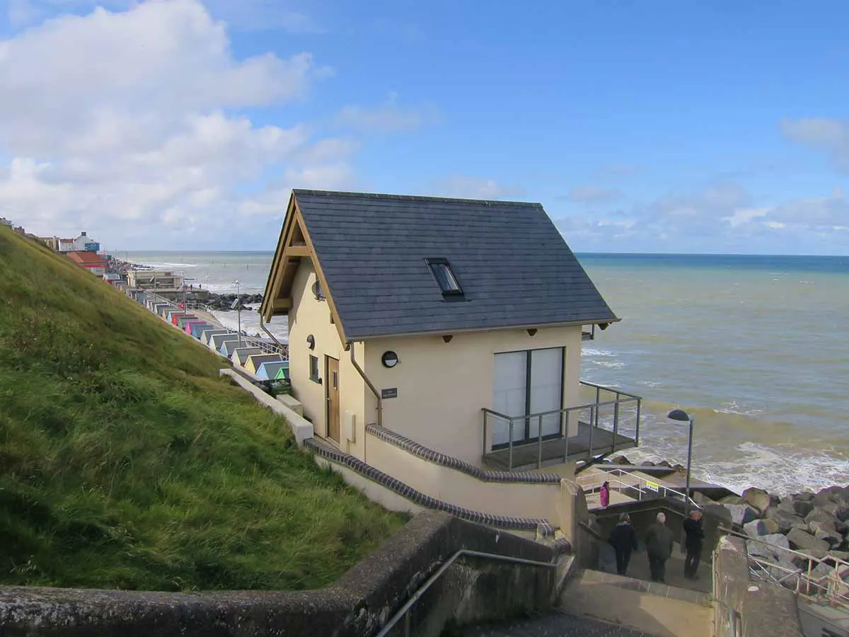 Photo showing a very small property on the coast.
