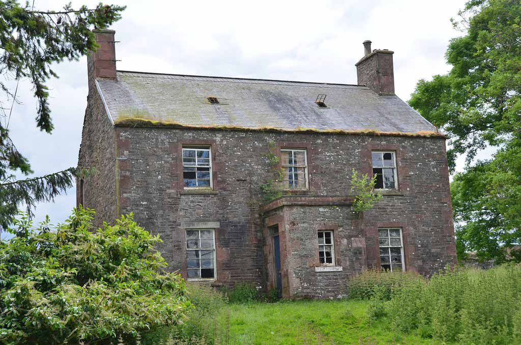 Image showing an abandoned and run-down house for sale in England