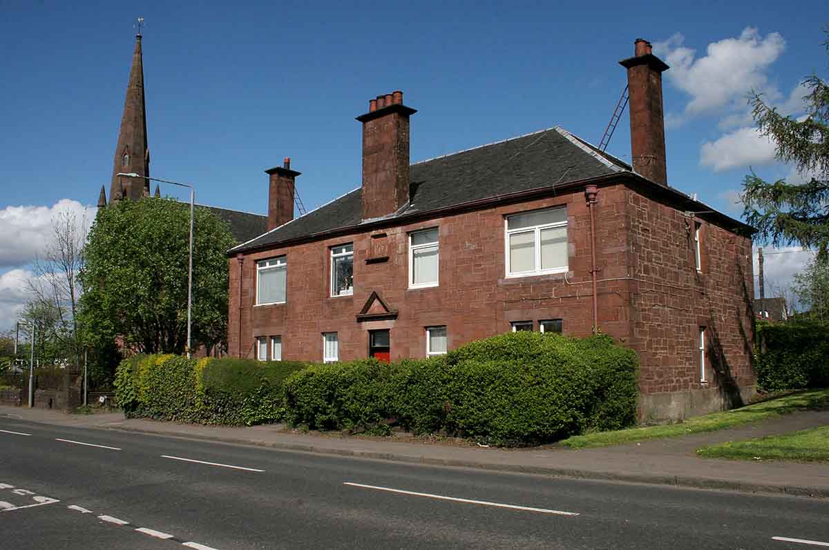 Photo of a beautiful red sandstone house in Scotland.