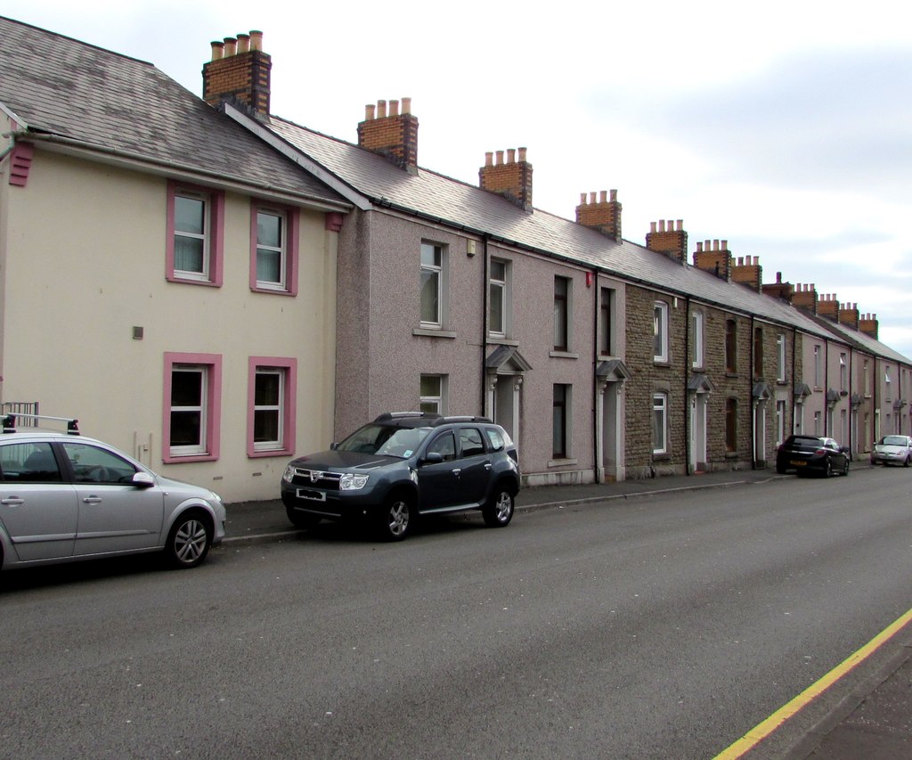Photo of older terraced houses on a street in Swansea, Wales